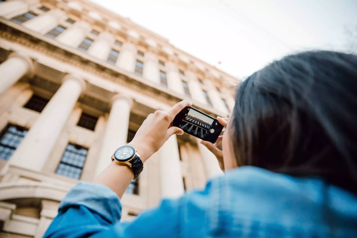 Spring Conference Tourist taking photo of a building